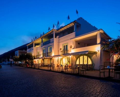 The magical scenery of the island of Stromboli, among the colors of wild nature and the scent of broom, this Boutique Hotel is located opposite the sea