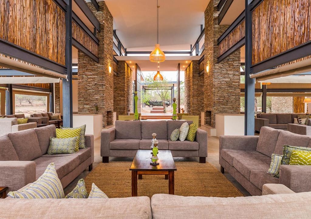 This luxury lodge is located west of the Kruger National Park to offer guests an ethnic-style retreat within the bushveld in the North-eastern Lowveld (Property for sale only)