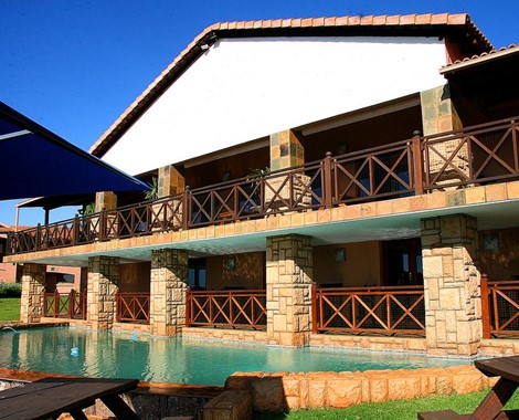 Enjoy panoramic views of the Indian Ocean and lush coastal hillsides