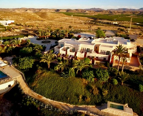A short distance from the beach, and with panoramic views of mountains and sea, this boutique hotel is a haven of tranquillity