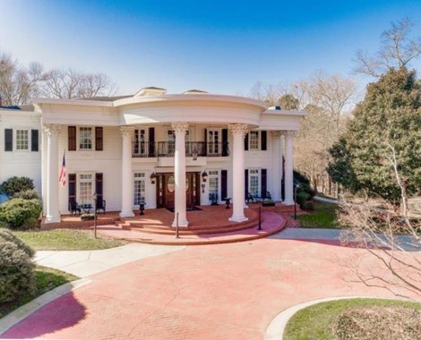 This Inn, a 10,000 square foot southern mansion set on 6+ wooded acres, designed and built by the owner and her family, has the feel of times past